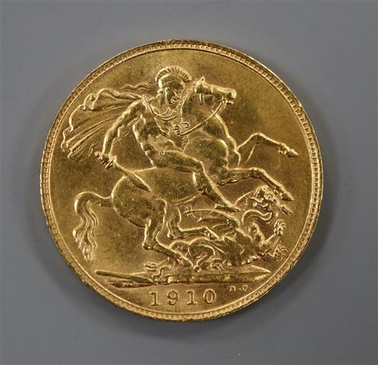 An Edward VII gold 1910 gold full sovereign.